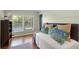 Bedroom with hardwood floors and neutral paint with plenty of natural light at 1195 Oglethorpe Ne Ave, Atlanta, GA 30319