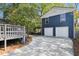 Exterior view of a two-car garage with adjacent yard space, showcasing a well-maintained driveway at 1195 Oglethorpe Ne Ave, Atlanta, GA 30319