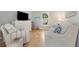Cozy living room area with hardwood floors, comfortable seating, and natural light at 1195 Oglethorpe Ne Ave, Atlanta, GA 30319