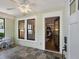 Cozy sun room with tiled floors, bench seating and view of living area at 1195 Oglethorpe Ne Ave, Atlanta, GA 30319