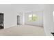 This bedroom features light colored carpet and natural light from the windows at 2065 Mozelle Dr, Marietta, GA 30062