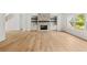 Inviting living room featuring hardwood floors, fireplace, and large window with views at 2065 Mozelle Dr, Marietta, GA 30062