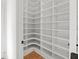 Organized walk-in pantry with custom shelves and ample storage for culinary essentials at 2065 Mozelle Dr, Marietta, GA 30062