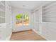A large walk-in closet with custom shelves and organizers provides ample storage space at 2065 Mozelle Dr, Marietta, GA 30062