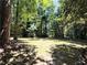 Lush backyard features mature trees and a sprawling lawn, creating a private oasis at 3312 Winter Wood Ct, Marietta, GA 30062