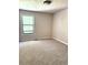 Empty bedroom with neutral paint and new carpet at 3312 Winter Wood Ct, Marietta, GA 30062