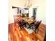 Dining room is complete with wood floors and decorative chandelier at 3312 Winter Wood Ct, Marietta, GA 30062