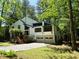 Stunning two-story home with white siding and a two-car garage nestled in a lush green landscape at 3312 Winter Wood Ct, Marietta, GA 30062