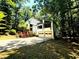 Inviting home featuring a two-car garage, driveway and mature trees at 3312 Winter Wood Ct, Marietta, GA 30062
