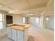 Spacious living room featuring a custom bar and lots of natural light at 3312 Winter Wood Ct, Marietta, GA 30062