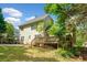 The backyard features a wooden deck perfect for outdoor relaxation and entertaining at 3338 Hackmatack Nw Dr, Kennesaw, GA 30152