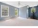 Spacious bedroom with three windows offering ample natural light, complemented by neutral carpeting at 3338 Hackmatack Nw Dr, Kennesaw, GA 30152