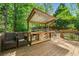 Back deck featuring a well-equipped outdoor kitchen area with a grill and countertop space at 3338 Hackmatack Nw Dr, Kennesaw, GA 30152