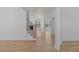 Bright and airy living room with hardwood floors, staircase, and fresh neutral paint at 4680 Glen Level Dr, Sugar Hill, GA 30518