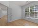 Office with hardwood floors, window and French door at 4680 Glen Level Dr, Sugar Hill, GA 30518
