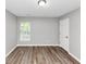 Bedroom with a window providing natural light and a door at 6252 Shenfield Ln, Union City, GA 30291