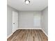 Bedroom with light gray walls and flooring at 6252 Shenfield Ln, Union City, GA 30291