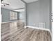Bright living room featuring stylish floors, fresh paint, and ample natural light at 628 Warren Ave, Scottdale, GA 30079