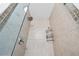 Shower stall with tile surround and modern fixtures at 628 Warren Ave, Scottdale, GA 30079
