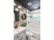 Modern bathroom with a soaking tub, stylish vanity, updated sink and hardware, and updated tiling at 877 Lee Andrews Se Ave, Atlanta, GA 30315