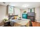 Cozy bedroom with a comfortable bed, side tables, and a dresser, creating a peaceful retreat at 877 Lee Andrews Se Ave, Atlanta, GA 30315