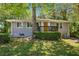 Charming home exterior with a well-manicured lawn and inviting curb appeal at 877 Lee Andrews Se Ave, Atlanta, GA 30315