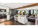 Open concept kitchen with stainless steel appliances and granite countertops at 877 Lee Andrews Se Ave, Atlanta, GA 30315