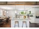 Stylish kitchen featuring stainless steel appliances, granite countertops, and a central island with seating at 877 Lee Andrews Se Ave, Atlanta, GA 30315