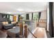 Open living room area with view of a staircase and second living space at 877 Lee Andrews Se Ave, Atlanta, GA 30315