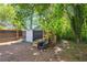 View of shed and firewood rack, with privacy fence and seating at 877 Lee Andrews Se Ave, Atlanta, GA 30315