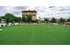 Large green lawn with benches and outdoor seating, ideal for community gatherings at 135 Alcovy Ter, Alpharetta, GA 30009