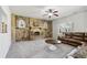 Inviting living room with stone fireplace, neutral carpet, and a comfortable, spacious layout at 681 Deer Springs Way, Loganville, GA 30052