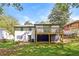 This beautiful house features a large backyard and wooden deck, great for entertaining at 4309 Gilbert Pl, Forest Park, GA 30297