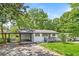 Charming single-story home with a covered carport and a cozy front porch at 4309 Gilbert Pl, Forest Park, GA 30297