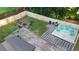 Well-maintained backyard with a patio, fire pit, and ample space for outdoor activities, fully fenced at 2447 Hillside Ave, Decatur, GA 30032
