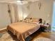 Serene main bedroom with neutral tones, hardwood floors, and ample natural light at 2447 Hillside Ave, Decatur, GA 30032