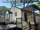 Charming home featuring a spacious deck and patio, perfect for outdoor entertaining and relaxation at 2447 Hillside Ave, Decatur, GA 30032