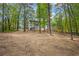Expansive backyard with mature trees, and ample space for recreation and relaxation at 3905 Mill Glen Dr, Douglasville, GA 30135