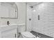 Modern bathroom featuring glass shower, stylish vanity, and updated fixtures at 3905 Mill Glen Dr, Douglasville, GA 30135