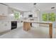 Bright, modern kitchen with stainless steel appliances, and a large center island at 3905 Mill Glen Dr, Douglasville, GA 30135