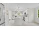Bright kitchen with stainless steel appliances, white cabinets, and center island at 3905 Mill Glen Dr, Douglasville, GA 30135