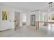 Spacious kitchen featuring stainless steel refrigerator, a center island, and a doorway to the house exterior at 3905 Mill Glen Dr, Douglasville, GA 30135