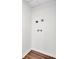 Laundry room with hookups, updated flooring, and base molding at 3905 Mill Glen Dr, Douglasville, GA 30135