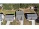 Aerial view of neighborhood homes, showing roof lines, yards and driveways at 401 Daffodil Dr, Temple, GA 30179