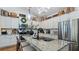 Kitchen showcases granite countertops, stainless steel appliances, and modern fixtures at 401 Daffodil Dr, Temple, GA 30179