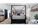 Comfortable main bedroom features stylish furnishings, neutral colors, and a peaceful ambiance at 401 Daffodil Dr, Temple, GA 30179