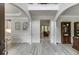 Open foyer with soaring ceilings, elegant archways, and views into the dining room and living spaces at 7035 W Mountain Xing, Cumming, GA 30041