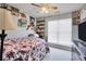 Bedroom with twin bed and ceiling fan at 8870 Dornoch Cir, Winston, GA 30187