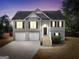 Charming two-story home with a two-car garage and inviting front entrance at 8870 Dornoch Cir, Winston, GA 30187
