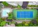 Aerial shot showcasing the pool, tennis court, and surrounding greenery of the community at 1250 Parkwood Circle Se # 1110, Atlanta, GA 30339